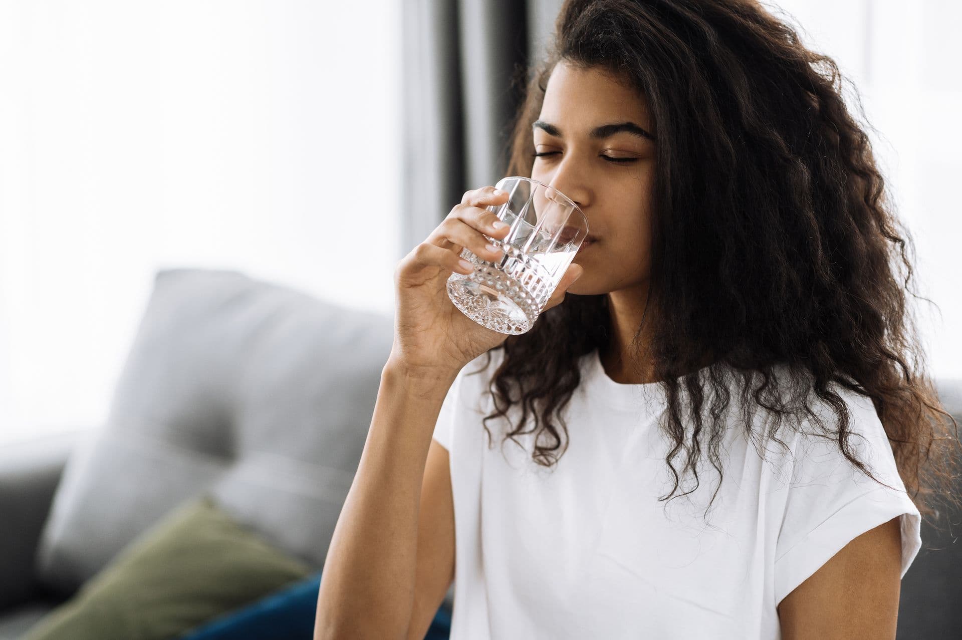 fewa-main- woman-drinking.jpg
